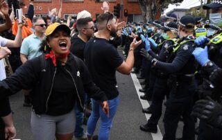 police-investigate-after-footage-shows-officer-push-woman-to-the-ground-before-spraying-at-anti-lockdown-protest