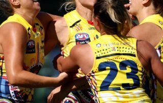 crows-hold-on-to-beat-magpies-in-thriller-as-lions,-blues-record-wins