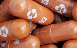expected-surge-in-covid-19-cases-prompts-call-for-antiviral-drugs-to-be-available-to-more-people