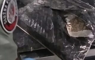 octogenarian-nabbed-with-five-kilograms-of-heroin-hidden-under-false-suitcase-bottom