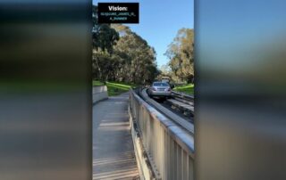 car-drives-along-bus-way-track-in-adelaide