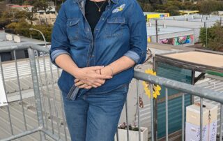 while-some-people-work-in-an-office,-xandra-tends-to-beehives-on-a-city-rooftop
