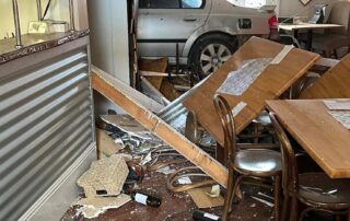 nearly-three-weeks-on,-car-remains-lodged-in-small-town-pub