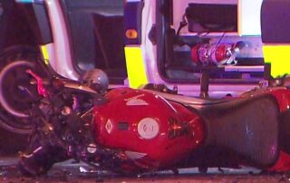 ‘suspended’-motorcycle-rider-dies-in-two-vehicle-crash,-woman-arrested-for-alleged-stabbing
