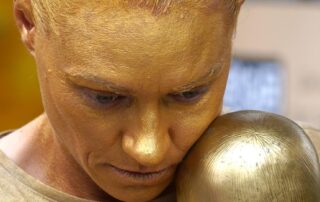 aflw-star-erin-phillips-dons-body-paint-to-highlight-homelessness