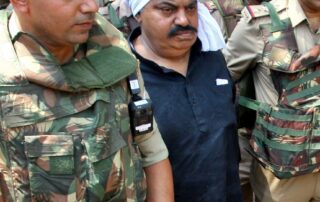 handcuffed-former-indian-politician-and-his-brother-shot-dead-on-live-tv