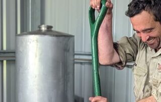 grapegrower-adam-barich-plays-whole-tones,-a-frequency-based-music,-while-fermenting-wine.