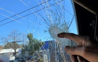 alice-springs-tour-operator’s-bus-damaged-after-rock-thrown-at-convoy-carrying-students