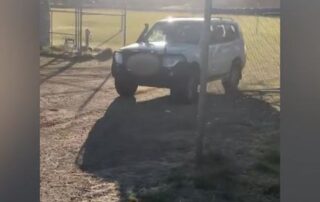 driver-rams-down-a-fence-in-a-vehicle-at-an-oval-in-mount-isa.
