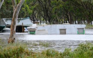 there’s-a-hidden-cost-to-being-underinsured.-this-flood-affected-caravan-park-is-finding-out-the-hard-way