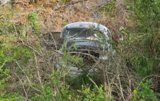 police-warn-of-‘downright-dangerous’-dumping-as-stolen-car-retrieved-from-sinkhole