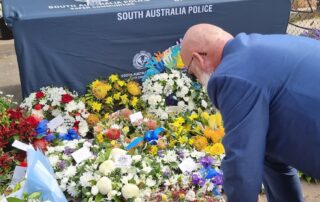 locals-lay-wreaths-as-police-and-small-sa-town-mourn-fallen-police-officer