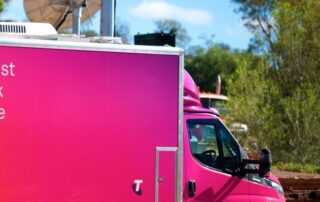 telstra’s-pink-bus-waived-a-woman’s-debt.-later,-she-found-out-she-was-also-entitled-to-$12,000