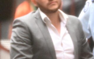 shooter-grins-in-court-before-being-jailed-for-nearly-three-decades-over-melbourne-boxing-event-murder