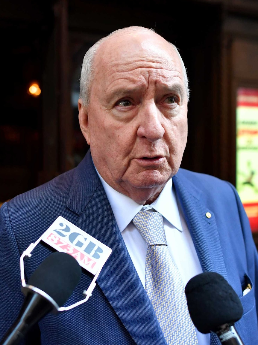 Alan Jones threatens defamation action over allegations he indecently