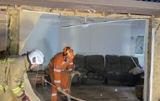 van-that-‘became-airborne’-narrowly-misses-two-people-in-lounge