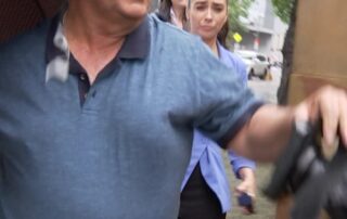 raelene-polymiadis’s-husband-shoves-media-outside-court-following-bail-hearing