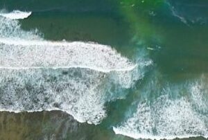 what-is-a-rip-at-the-beach-and-how-do-you-safely-swim-out-of-one?