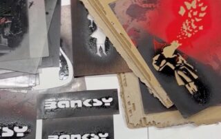 spanish-police-uncover-syndicate-allegedly-selling-fake-banksy-pieces-for-up-to-$2,480-each
