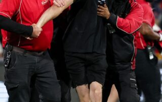 afl-hands-adelaide-pitch-invader-a-life-ban-for-‘unsafe-and-unlawful’-incident-during-cats-game