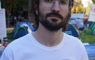 ‘cowardly-tactic’:-fireworks-thrown-at-university-protest-camp