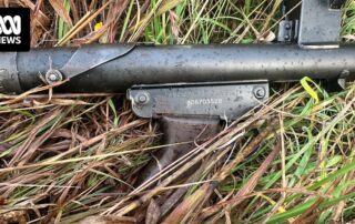 submachine-gun-fired-in-hotel-room-among-dozens-of-firearms-seized-in-tasmania